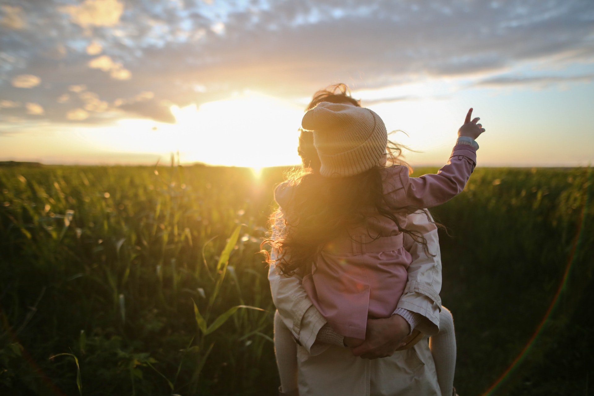 mother-and-daughter-on-grass-1683975